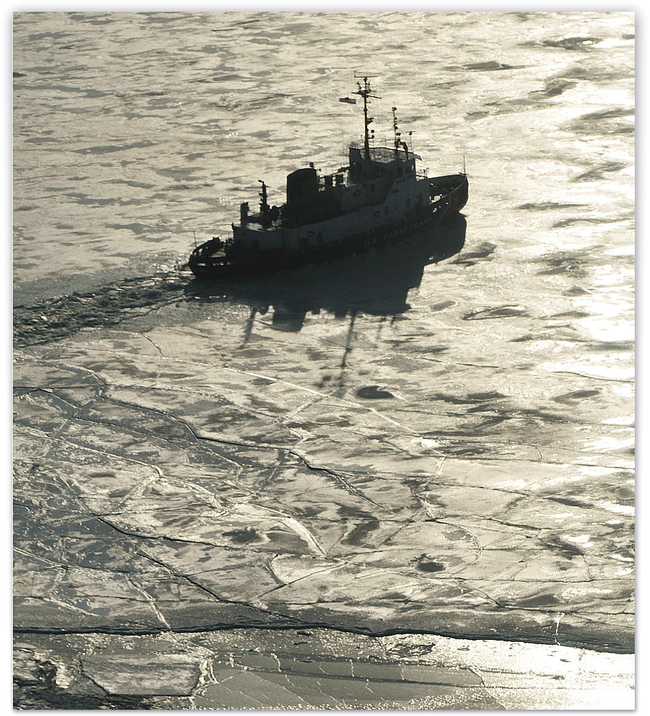 Silhoutte of the Biscayne Bay cracking the ice shelf at Beaver Harbor