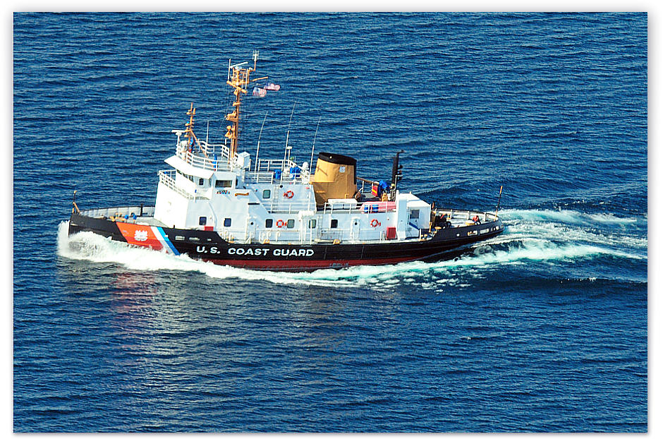 Starboard Side view of the Biscayne Bay Coast Guard Ice Breaker heading for Charlevoix to free the Emerald Isle from Round Lake