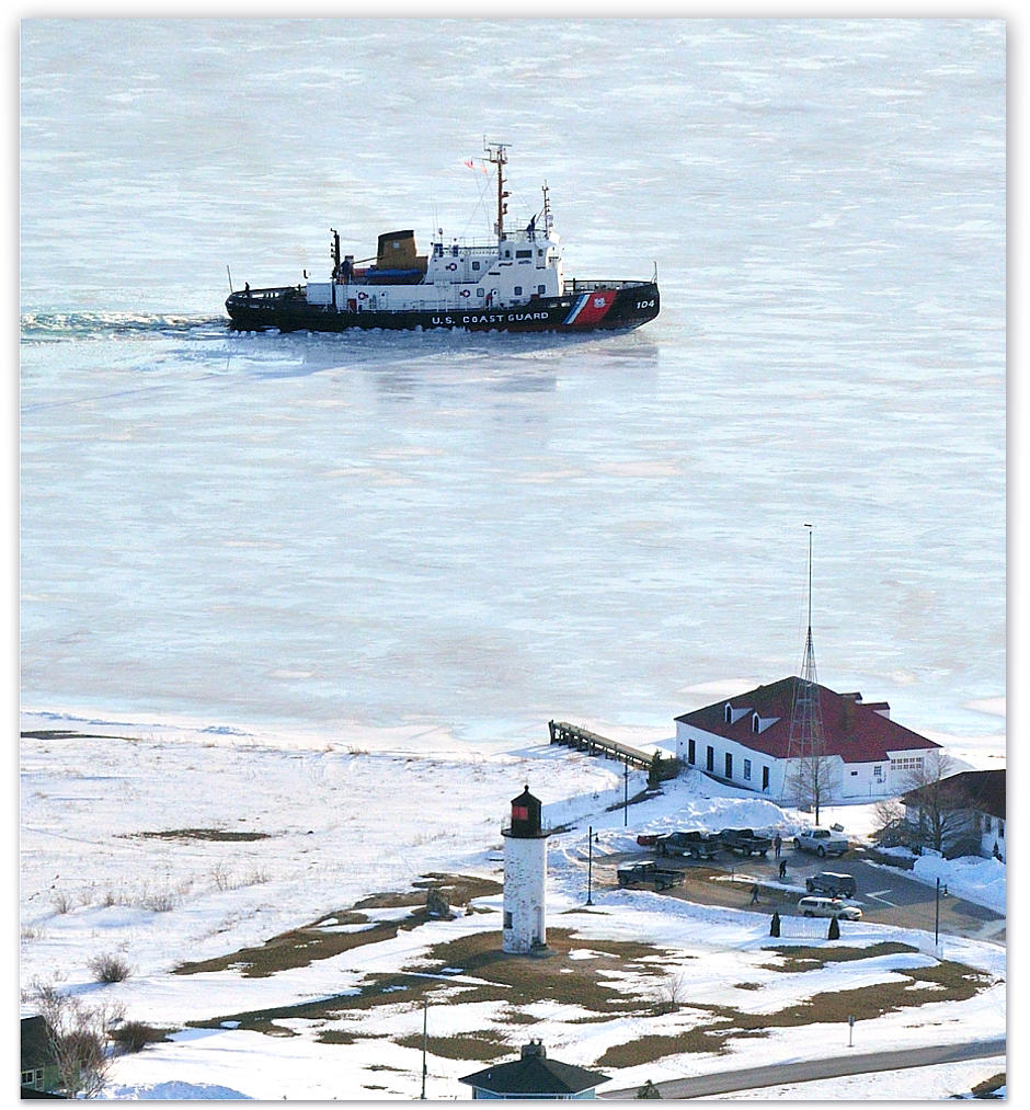The Biscayne Bay passing the Whiskey Point ligthouse and the CMU Boathouse Coast Guard Station on Whiskey Point