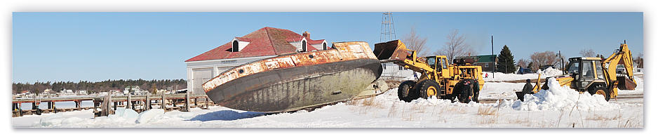 The following morning loaders push her toward the water