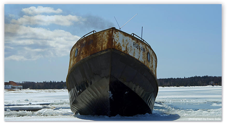 And now the clearing of the main channel can begin to free the Emerald Isle at the dock for her return trip to Charelvoix