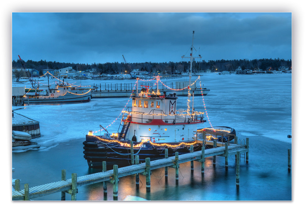 The Tug Wendy Anne lighting up the Beaver Island harbor for the holidays